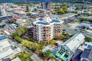 an aerial view of a city with buildings at Beach Palms Holiday Apartments in Gold Coast