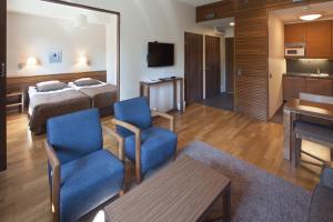TV a/nebo společenská místnost v ubytování Lapland Hotels Luostotunturi & Amethyst Spa
