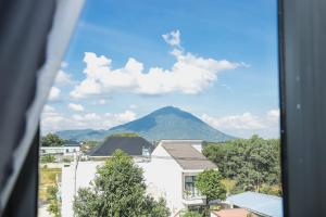 a view from a window of a mountain at Le Phan Hotel in Tây Ninh