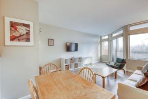 a living room with a table and a couch at Village Gate Unit 209 in Warren