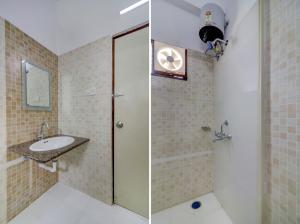 a bathroom with a sink and a shower at Destino By INR Suites in Hyderabad