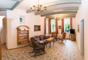 a living room with a couch and a table at Ferienwohnung 1 Holthusen 25514 in Weener