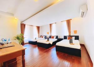 Een bed of bedden in een kamer bij Baan Soksan