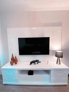 TV a/nebo společenská místnost v ubytování São Paulo Moema Times Square - Suite LUXO