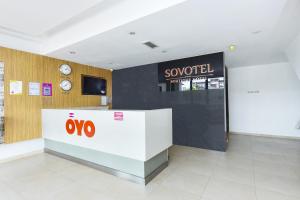 an office lobby with a soo sign on a wall at Super OYO 90512 Sovotel Kelana Jaya 79 in Petaling Jaya