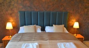 A bed or beds in a room at TATRANSKY DOM sk