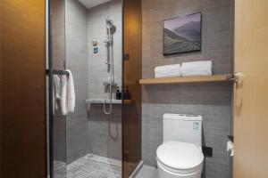 Ένα μπάνιο στο Atour Hotel Zezhou Road Jincheng +5 φωτογραφίες