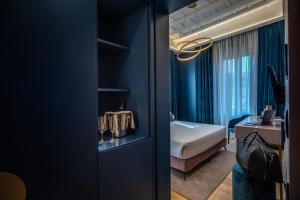 Posteľ alebo postele v izbe v ubytovaní Palazzetto Trevi