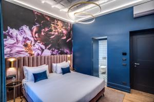 Posteľ alebo postele v izbe v ubytovaní Palazzetto Trevi