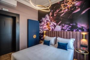 Posteľ alebo postele v izbe v ubytovaní Palazzetto Trevi