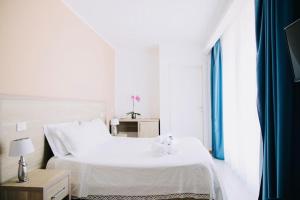 Кровать или кровати в номере Hotel Villa Sveva