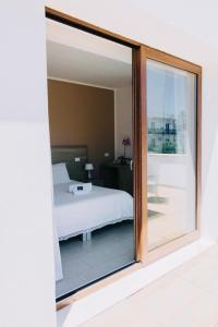 Кровать или кровати в номере Hotel Villa Sveva