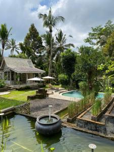 Bazén v ubytování Aventus Resort Ubud nebo v jeho okolí