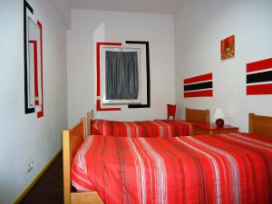 Posteľ alebo postele v izbe v ubytovaní HI Aveiro – Pousada de Juventude