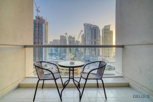 Balkón nebo terasa v ubytování Coastal 1BR at Iris Blue Dubai Marina by Deluxe Holiday Homes