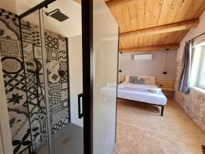 Le Mangiatoie del Cavaliere tesisinde bir odada yatak veya yataklar