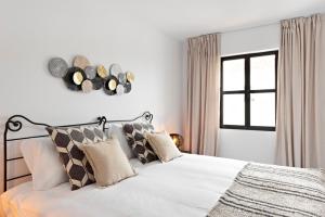 Posteľ alebo postele v izbe v ubytovaní 3 bedroom apartment in the heart of Puerto Banús