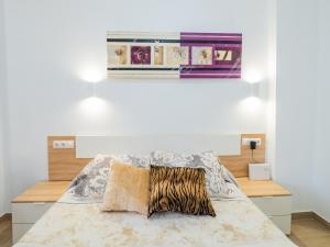 Posteľ alebo postele v izbe v ubytovaní Cubo's Urban Studio Turisbelen