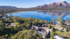 an aerial view of a lake with boats in it at Freycinet Stone Studio 4 - Granite in Coles Bay