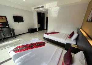 Postel nebo postele na pokoji v ubytování Naiyang Beach Hotel SHA Plus