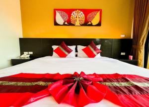 Postel nebo postele na pokoji v ubytování Naiyang Beach Hotel SHA Plus