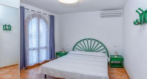 Posteľ alebo postele v izbe v ubytovaní Accogliente appartamento con vista mare