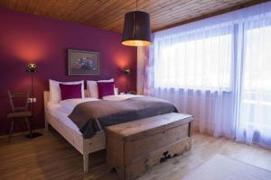 Postel nebo postele na pokoji v ubytování Ferienhaus Alpavera