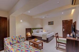 Guruprerna Beacon Resort, Dwarka客房内的一张或多张床位
