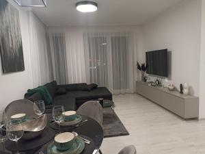 A television and/or entertainment centre at MBV28 Apartments