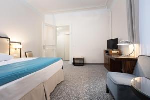Postel nebo postele na pokoji v ubytování OREA Spa Hotel Bohemia Mariánské Lázně