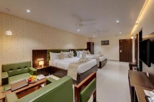 Guruprerna Beacon Resort, Dwarka客房内的一张或多张床位