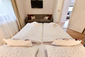 Posteľ alebo postele v izbe v ubytovaní Villa Diva Grabovčeva