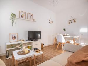 Televízia a/alebo spoločenská miestnosť v ubytovaní Gran plaza home - Vacacional Sevilla