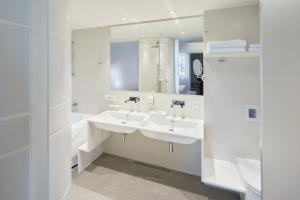 Um banheiro em Holiday Inn Vilnius by IHG