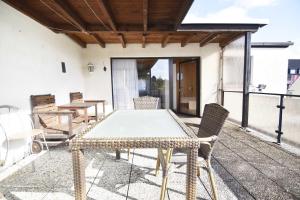 a table and chairs sitting on a patio at Work & Stay in Sankt Augustin near Troisdorf in Sankt Augustin