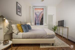 Postel nebo postele na pokoji v ubytování Clavature Suite