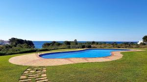 Bazén v ubytování MSJ80 Moderno Bajo Marina Sant Jordi nebo v jeho okolí