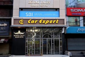 a car expert store on a city street at ROYAL LALIT Grand Hotel in Karnal