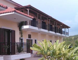 a building with balconies on the side of it at Dimitra in Dháfni