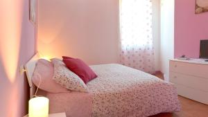 Letto o letti in una camera di Dimora nel borgo