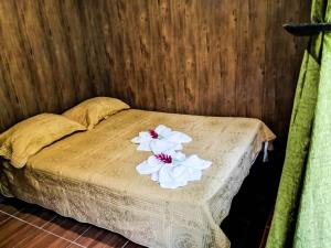 Postel nebo postele na pokoji v ubytování Cabañas Montañas del Tenorio