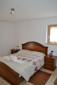 Un pat sau paturi într-o cameră la Agritur Agribaldo Lavanda