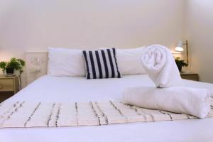 Postel nebo postele na pokoji v ubytování Camden Motor Inn + 37 fotografií