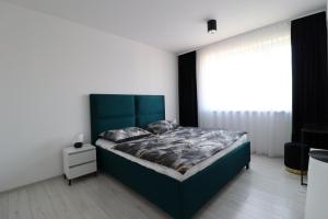 A bed or beds in a room at MBV28 Apartments
