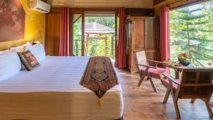 Postel nebo postele na pokoji v ubytování Jasmin Garden Koh Kood