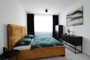 A bed or beds in a room at MBV28 Apartments