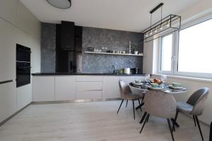A kitchen or kitchenette at MBV28 Apartments
