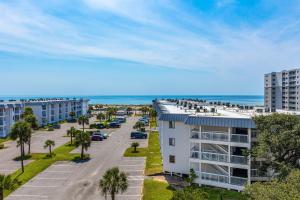an aerial view of a building with the ocean in the background at Plantation 4514 in Gulf Shores