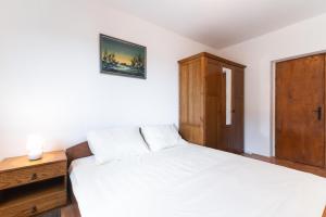 Postel nebo postele na pokoji v ubytování Beachfront apartments Calm Sea