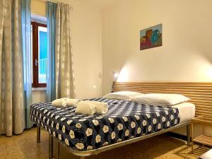 En eller flere senge i et værelse på Monterosso apartment old city